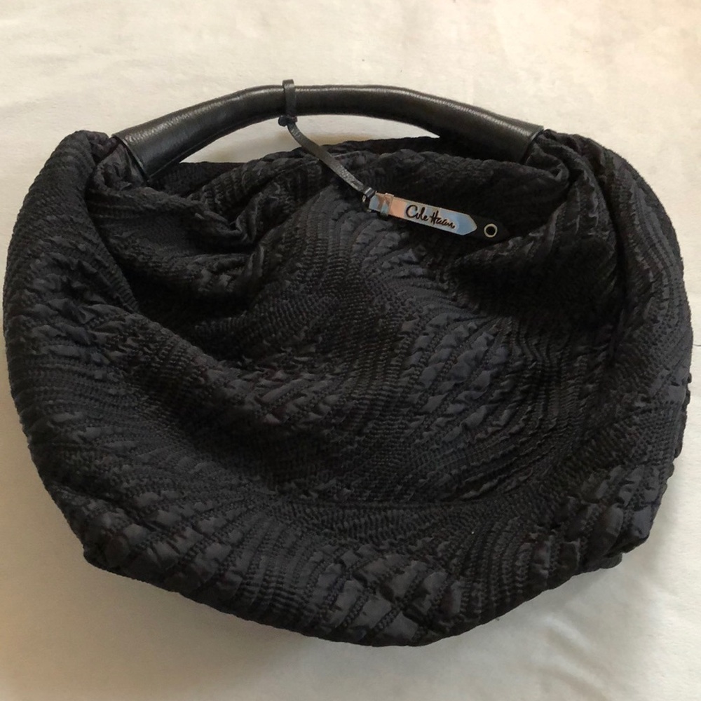 Cole Haan purse offers welcome
